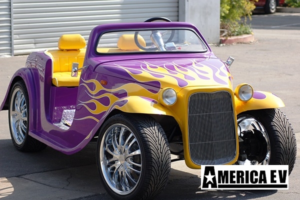 Purple California Roadster with Yellow Flames affordable golf cart rental, golf cart rent massachusetts