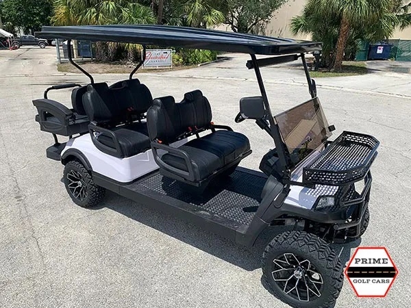 White Aluma 6 Passenger Lifted Golf Cart affordable golf cart rental, golf cart rent massachusetts